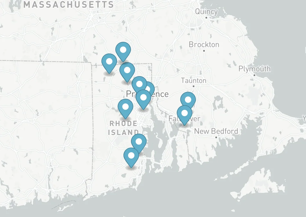 Map of Rhode Island with multiple location markers, showing cities and surrounding areas.